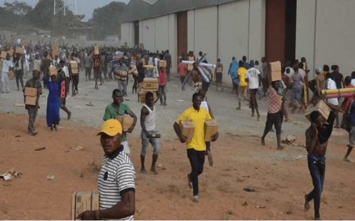 Warehouses in Nigerian capital were looted government ordered arrest and prosecution of participants