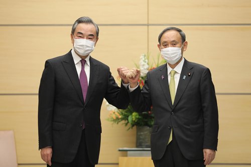 Japanese Prime Minister Yoshihiro Kan met with Wang Yi