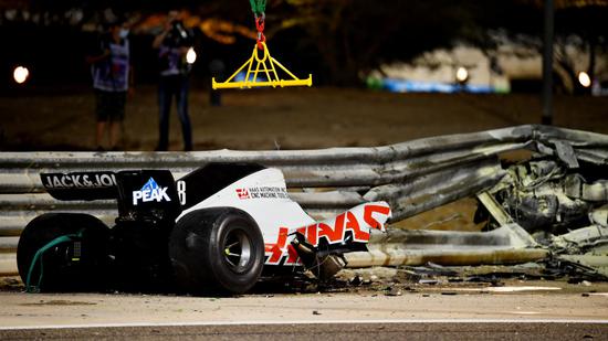 A racing car crashed into a wall in F1 Bahrain and exploded. The driver escaped from death