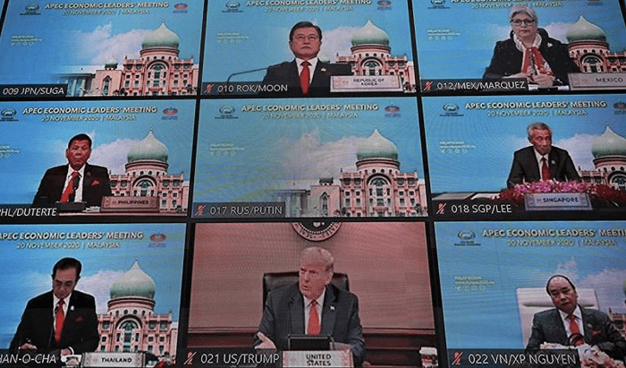 Trump attended the APEC online meeting but refused to use the official video background