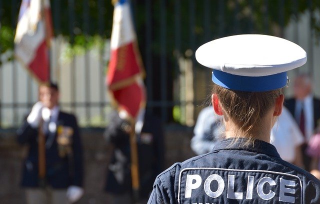 Four policemen in Paris, France, were prosecuted for beating black people. Two people were detained.