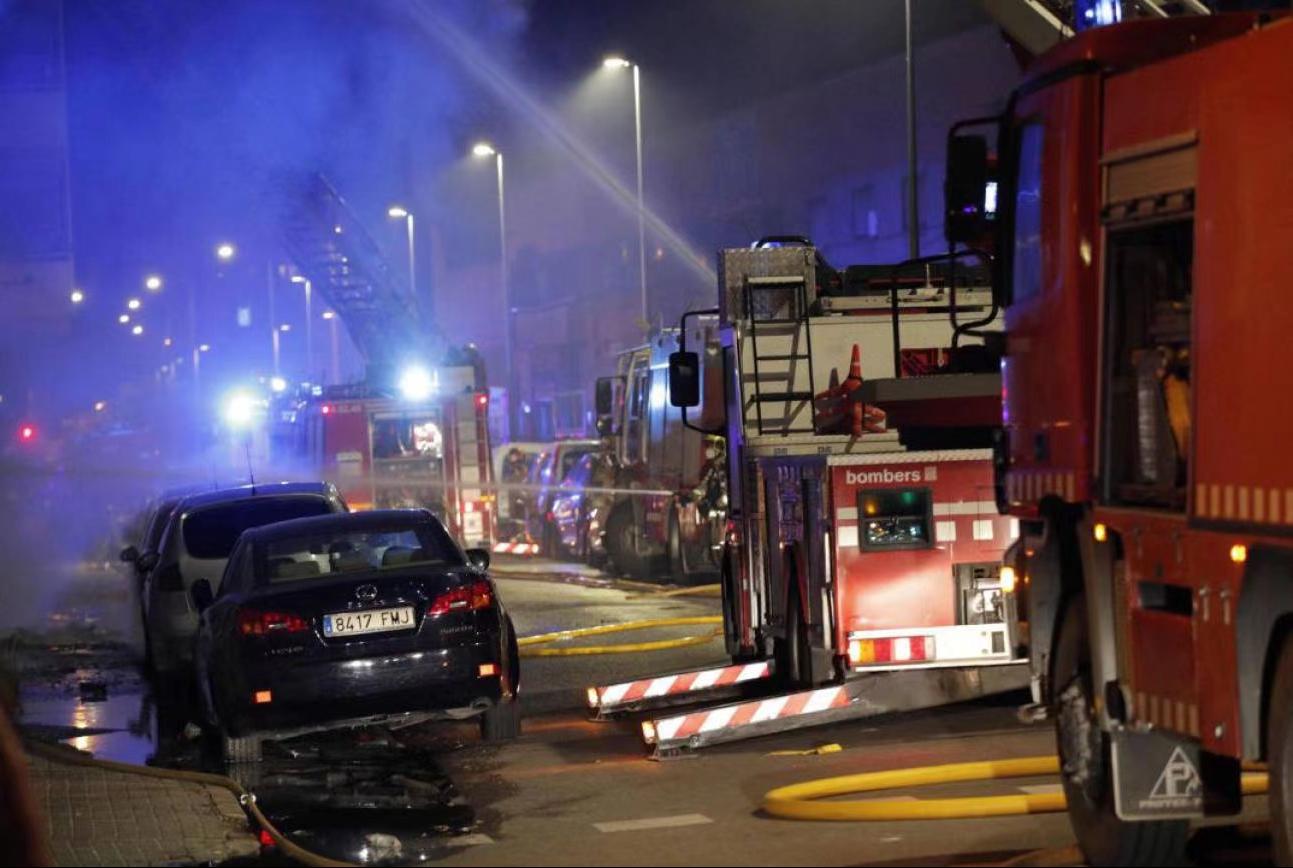 An abandoned warehouse caught fire in Catalonia, Spain, killing at least two people and injuring 17 others.