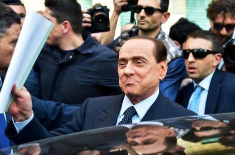 Former Italian Prime Minister Berlusconi was absent from the hearing, and his health status was of concern.