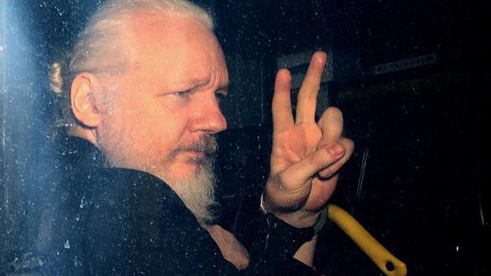Edward Snowden calls on Trump to pardon Julian Assange