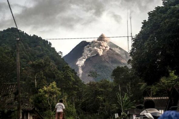 The eruption of Mount Merapi in Indonesia, and huge gray clouds rush to the sky