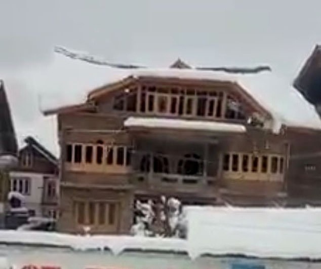 A three-storey house in India collapsed due to heavy snow.