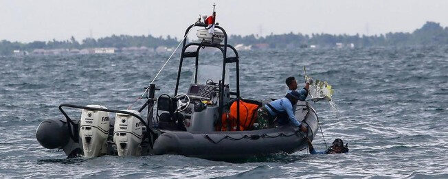 Indonesia's search for the crash was interrupted due to weather.