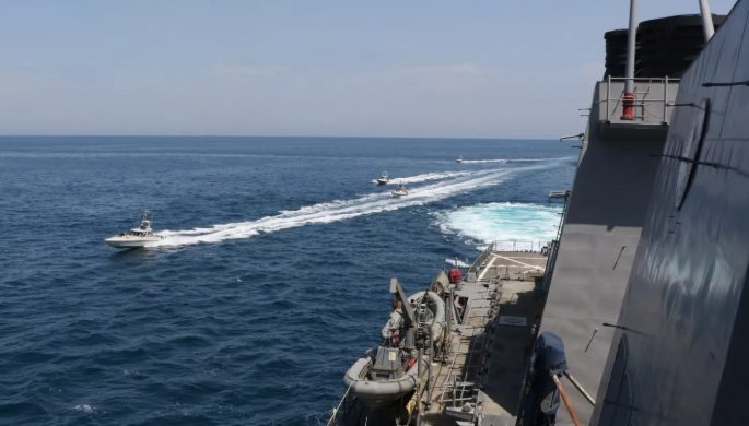 U.S.-Iranian ship Persian Gulf wipes away guns, U.S. troops fire warning shots at Iranian patrol boats