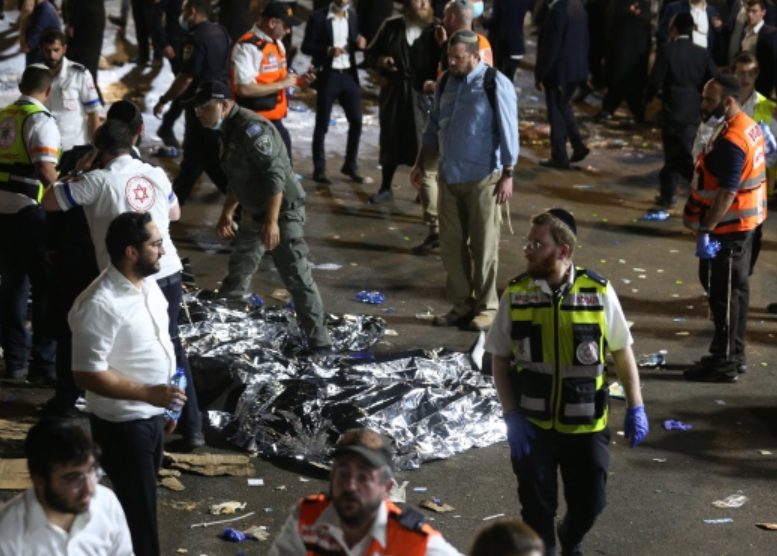 Israeli stampede kills 40: More than 30 children and parents lost access to slip-through tragedy