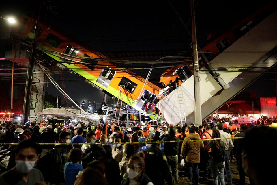 Twenty people have died and dozens injured in a bridge collapse in Mexico