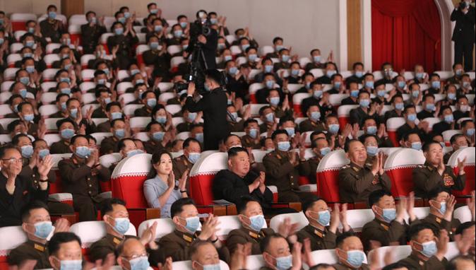 Kim Jong-un watches a performance by members of the Korean People's Army