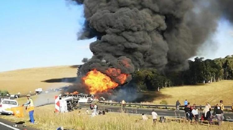 Four people have been killed and many injured in a collision between a bus and a tanker truck in South Africa
