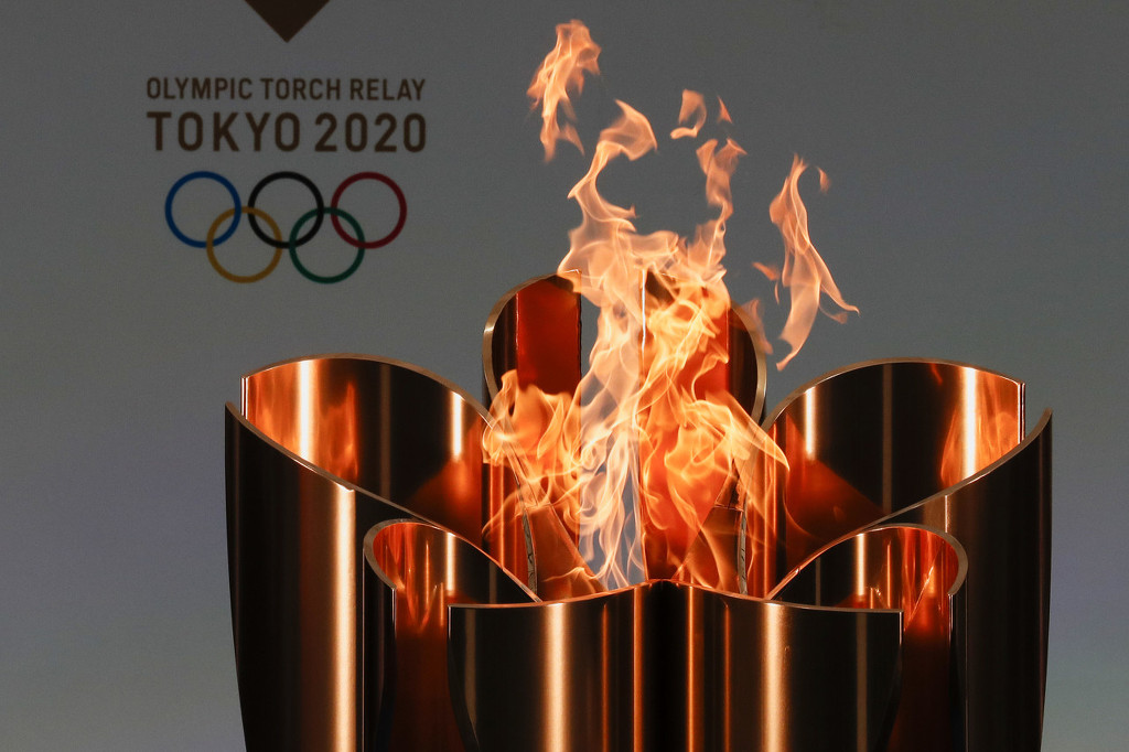 The Tokyo Olympic torch is carried "behind closed doors" in Hiroshima