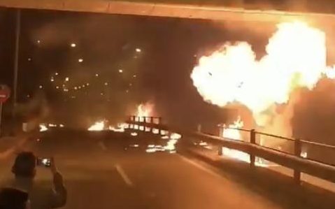 A group of young people in Athens, Greece, are celebrating a traditional holiday in a dangerous way that has started a fire