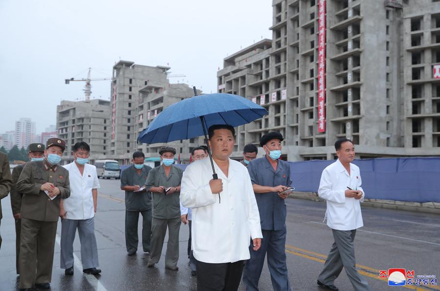 Kim Jong-un inspects a residential construction project in Pyongyang