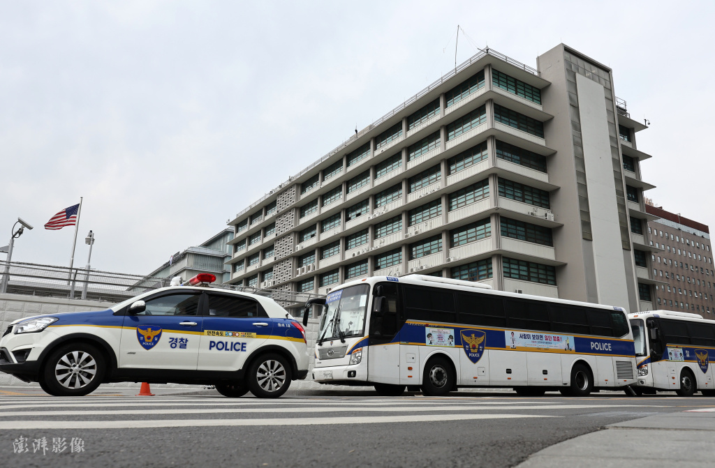 The U.S. Embassy in South Korea stepped up guard, and police cars grew up.